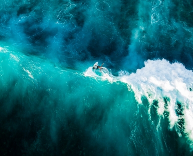 Surfing in Nusa Lembongan, Bali, Indonesia