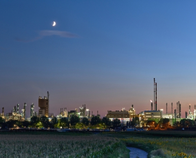 Chemical Plant Rising from the Fields