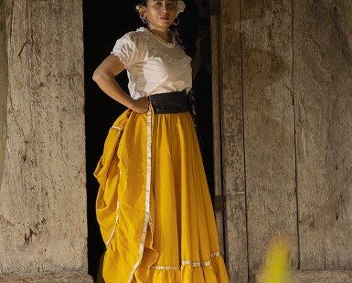 Woman behind the grass 