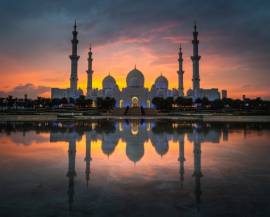 Grand Mosque, with reflection in rain puddle