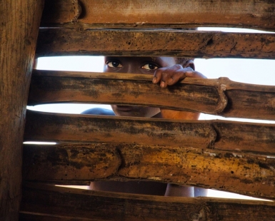 Ivory Coast - child face at a hut in nowhere